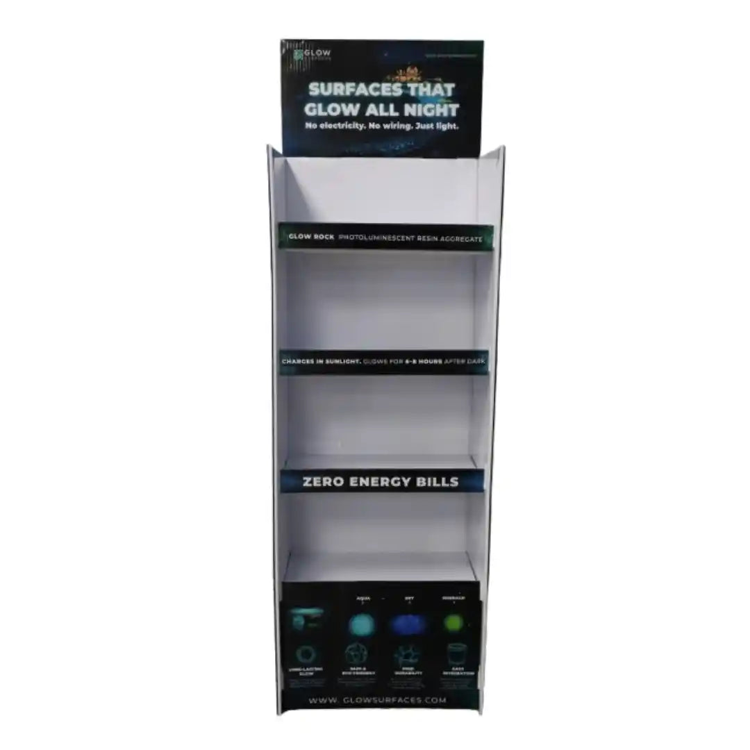 Glow Rock retail display stand filled with Glow Rock jars in Aqua, Sky and Emerald Green – 4-shelf floor display with Surfaces That Glow All Night header